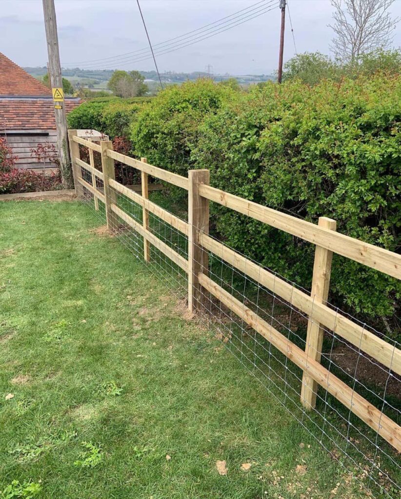 This is a photo of a picket fence and picket gate installed by Fast Fix Fencing Rochester